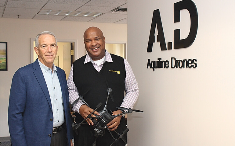 Barry Alexander (right), CEO of Aquiline Drones, with his chief strategic advisor, Brooks Bash, a retired Air Force lieutenant general in Aquiline’s Stark Building offices in downtown Hartford.
