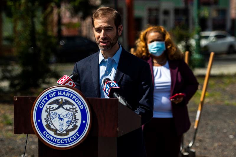 Hartford Mayor Luke Bronin speaks at a press conference for a groundbreaking of a new development project on the corner of Park Street and Main Street in downtown Hartford on Aug. 18. (Kassi Jackson/The Hartford Courant)
